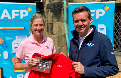 Helen James (Huddersfield group) 1st red shirt presented by monthly sponsor Andy Bennell