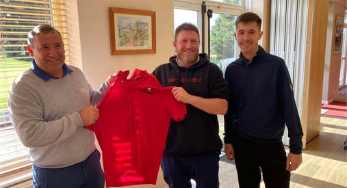 Lawrence Down Bournemouth Co-Ambassdor presenting Clifford Johnson with his 1st Red Shirt along with Wesley Glover the Group event sponsor